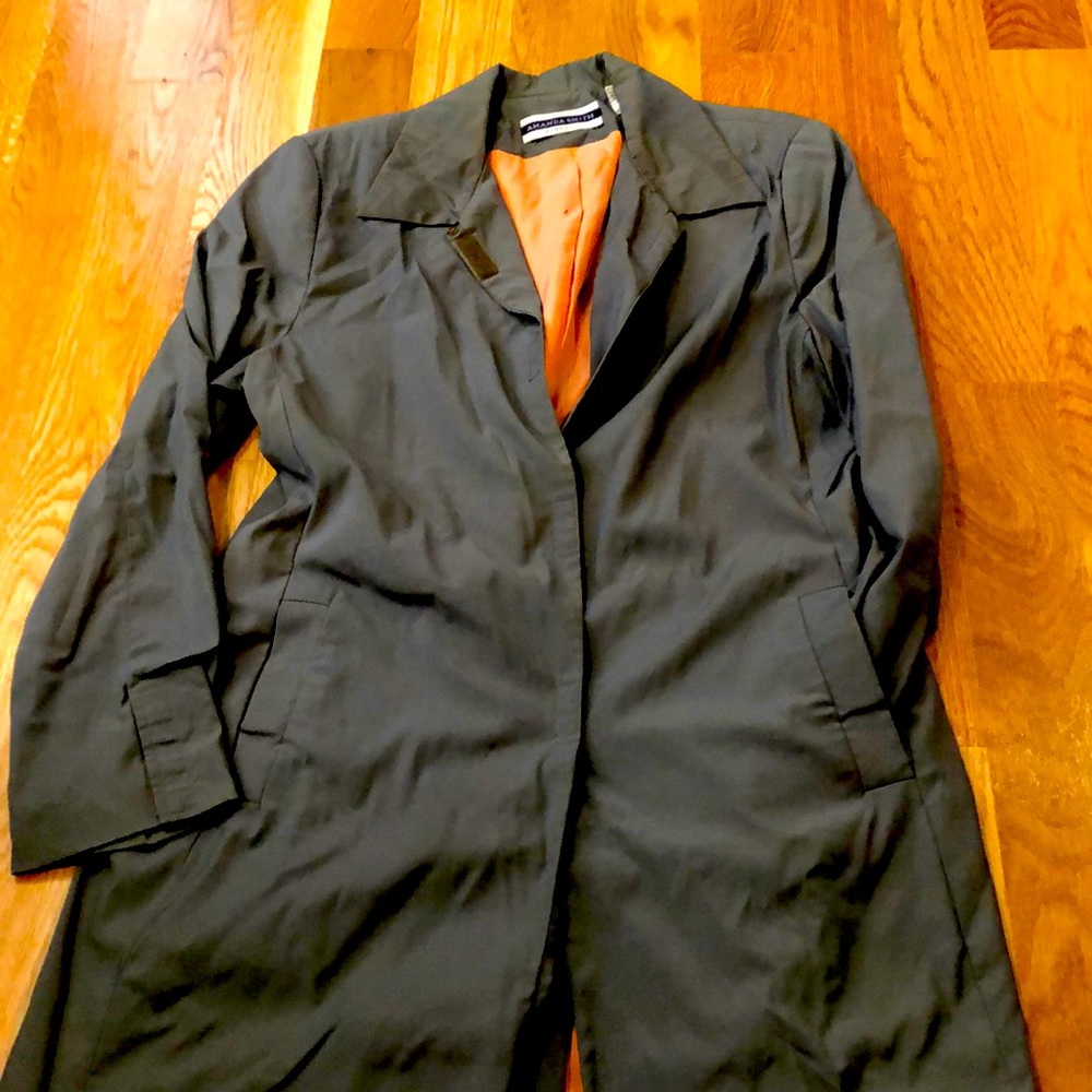 Two piece pea green skirt suit.